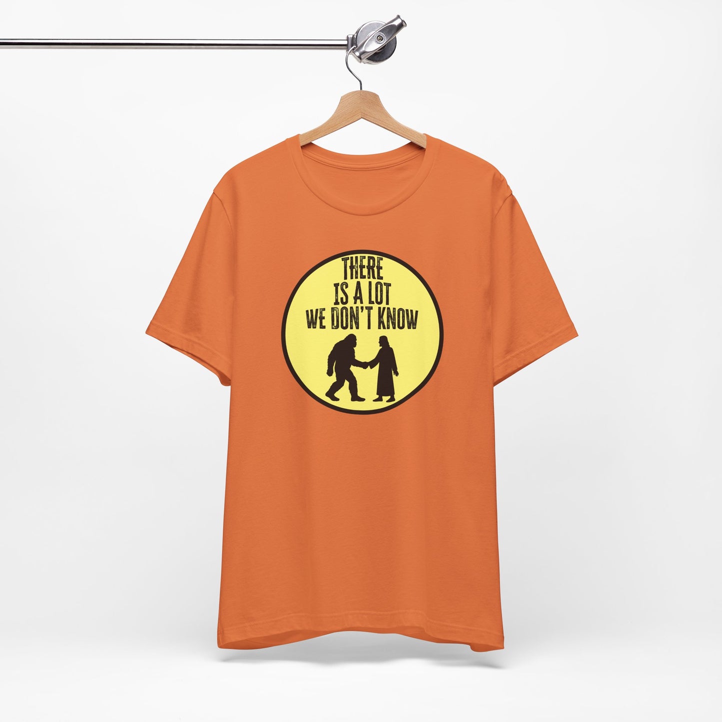 'There Is A Lot We Don't Know" (Bigfoot Meets Jesus) (Soft, Quality Bella & Canvas <Or Comparable> Unisex Tee)