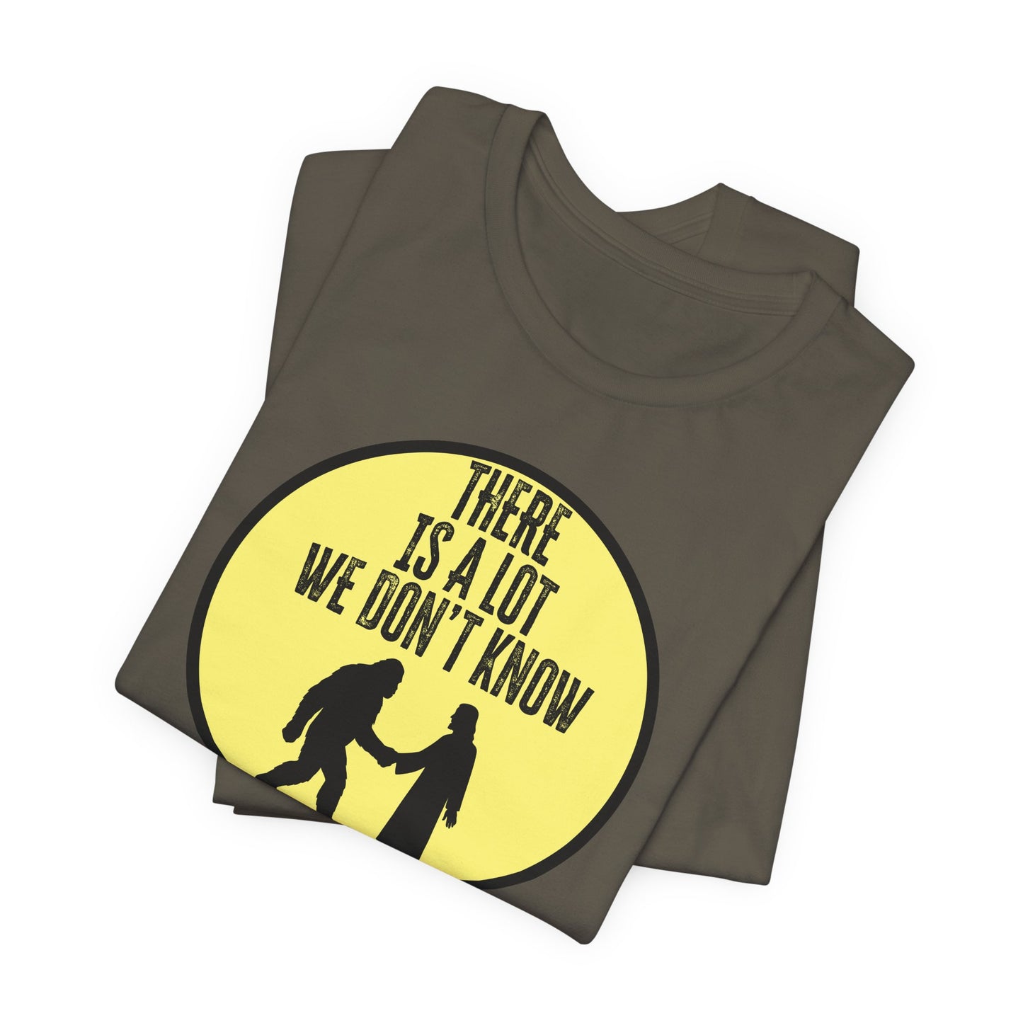 'There Is A Lot We Don't Know" (Bigfoot Meets Jesus) (Soft, Quality Bella & Canvas <Or Comparable> Unisex Tee)