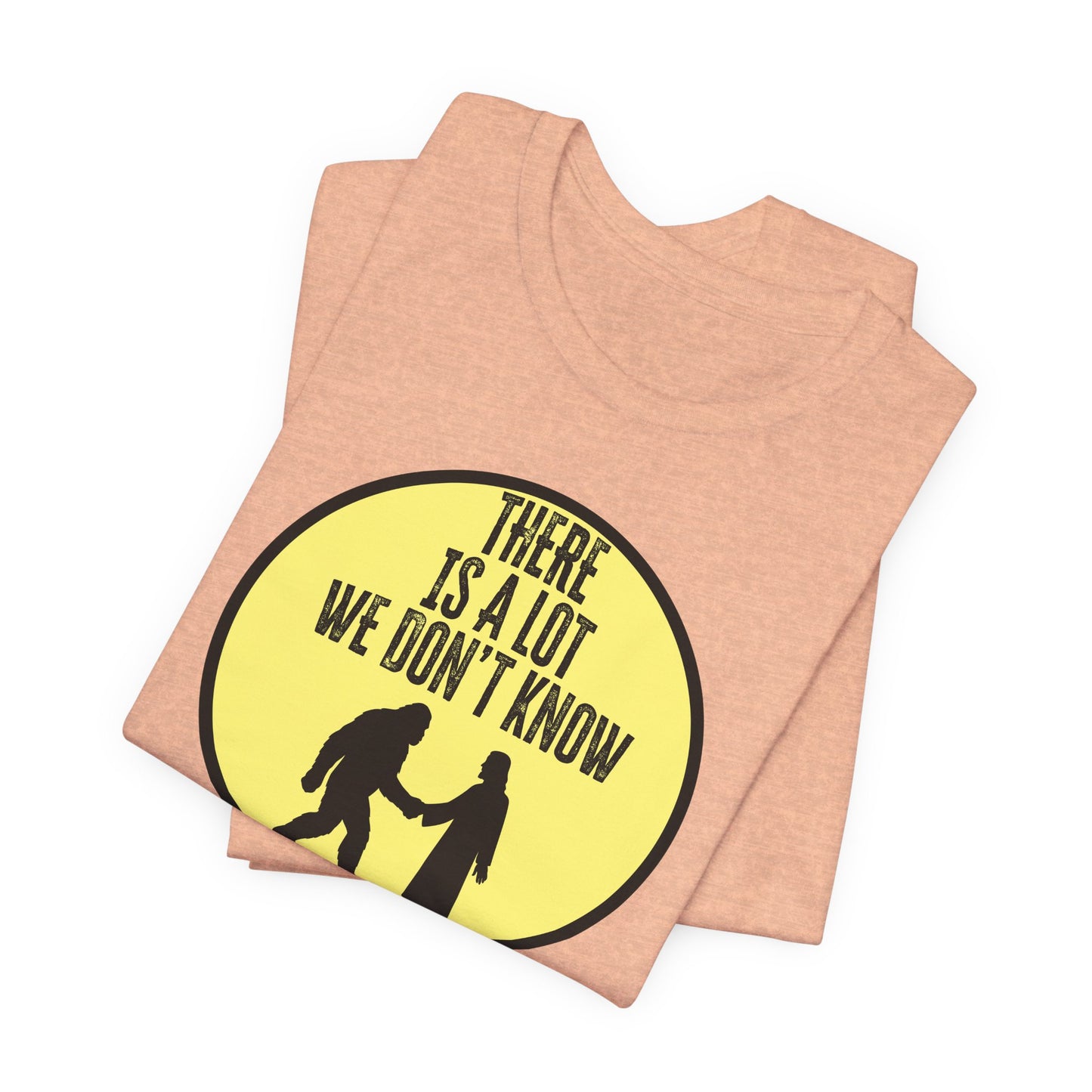 'There Is A Lot We Don't Know" (Bigfoot Meets Jesus) (Soft, Quality Bella & Canvas <Or Comparable> Unisex Tee)