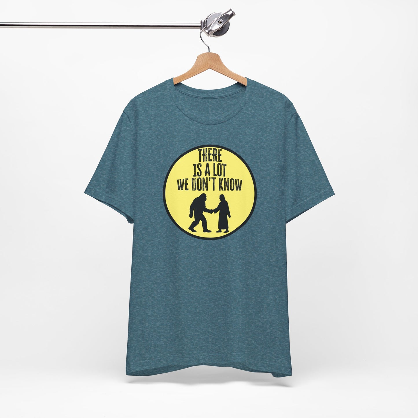 'There Is A Lot We Don't Know" (Bigfoot Meets Jesus) (Soft, Quality Bella & Canvas <Or Comparable> Unisex Tee)