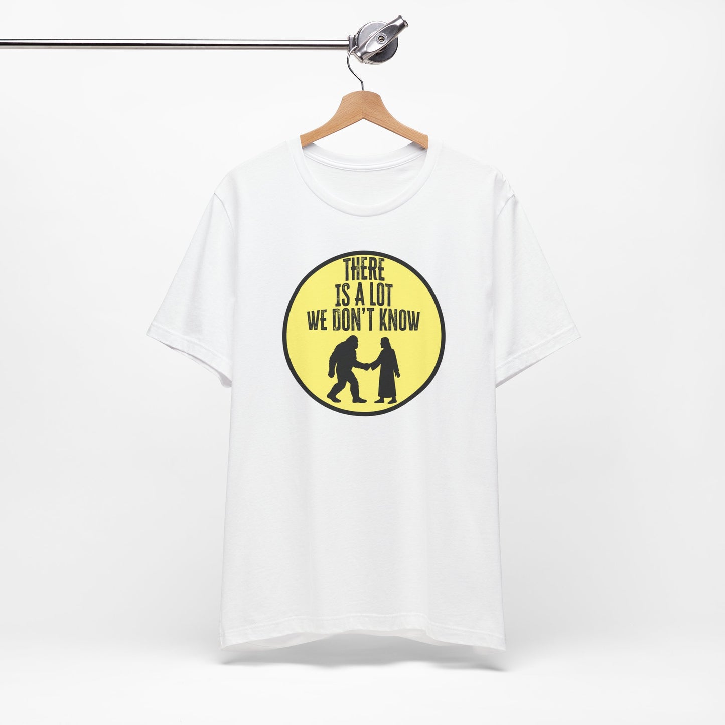 'There Is A Lot We Don't Know" (Bigfoot Meets Jesus) (Soft, Quality Bella & Canvas <Or Comparable> Unisex Tee)
