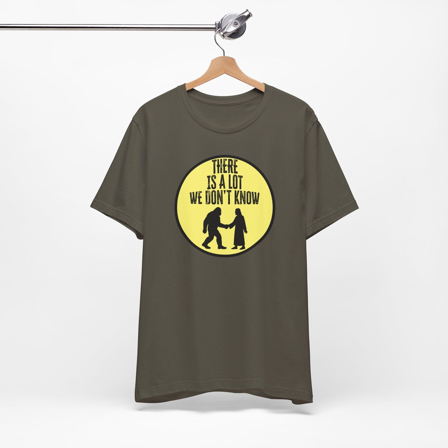 'There Is A Lot We Don't Know" (Bigfoot Meets Jesus) (Soft, Quality Bella & Canvas <Or Comparable> Unisex Tee)