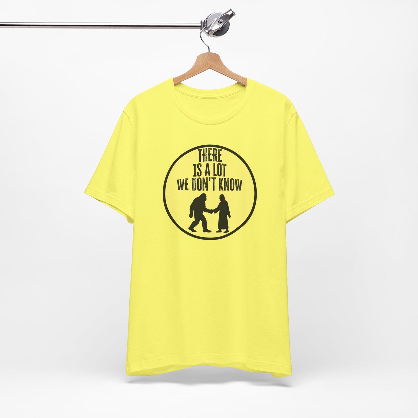 'There Is A Lot We Don't Know" (Bigfoot Meets Jesus) (Soft, Quality Bella & Canvas <Or Comparable> Unisex Tee)