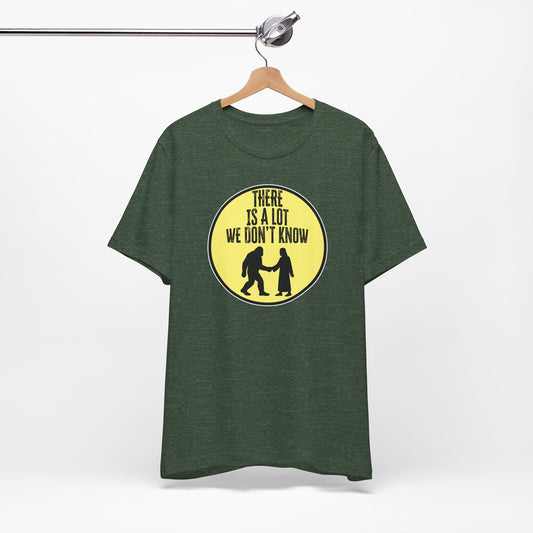'There Is A Lot We Don't Know" (Bigfoot Meets Jesus) (Soft, Quality Bella & Canvas <Or Comparable> Unisex Tee)
